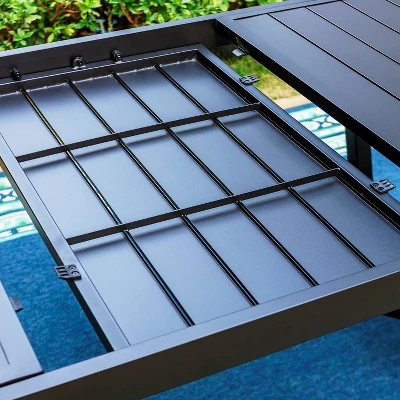 9pc Patio Set With Steel Expandable Table & Padded Sling C-Spring Arm Chairs - Captiva Designs 6 9pc Patio Set With Steel Expandable Table & Padded Sling C-Spring Arm Chairs - Captiva Designs - Image 4