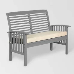 Ravenscroft Modern Boho Acacia Wood Slatted Outdoor Loveseat With Cushion - Saracina Home -Outdoor Furniture Store GUEST d34b2324 8da3 44de b35e 2463e261fae8